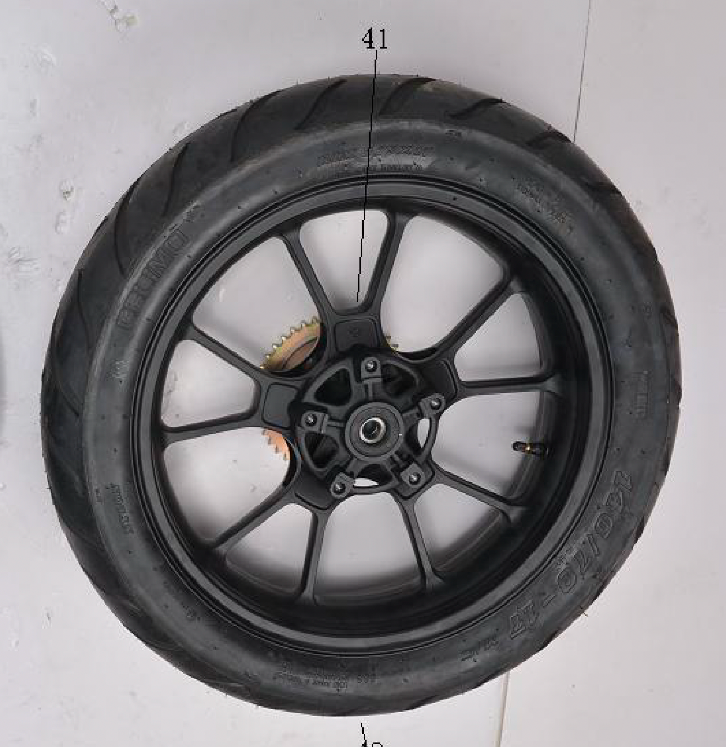 Rear Tire 140/70-17 for sale. Venom X22 rear rim for sale.