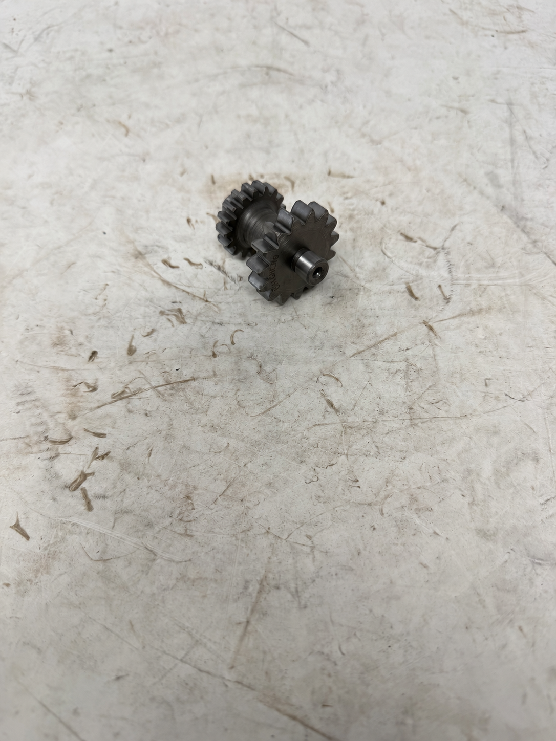 Starter reduction gear No. 2 for DF250RTG Sportster 250cc motorcycle, reverse view of double gear and shaft