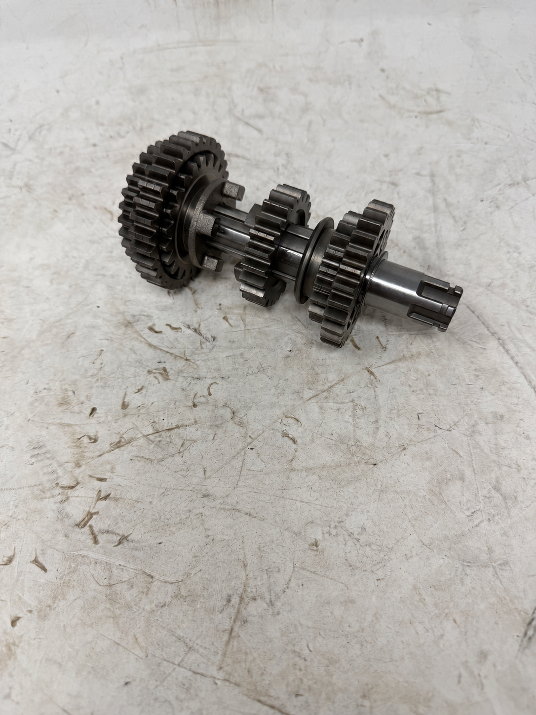 Transmission countershaft gear assembly for DF250RTG Sportster 250cc motorcycle, opposite view of shaft and gears