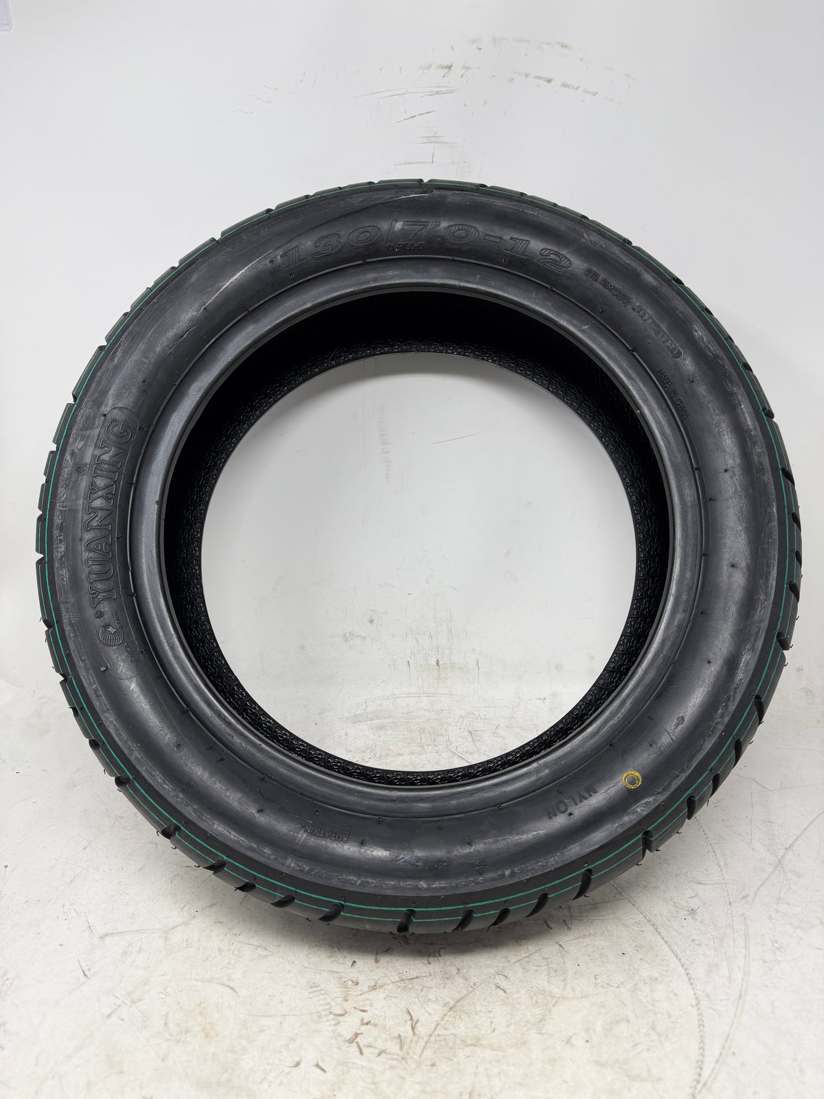 130/70-12 motorcycle tire, full sidewall view