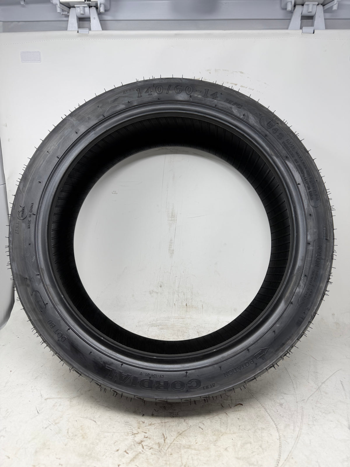 140/60-14 motorcycle tire, full sidewall view
