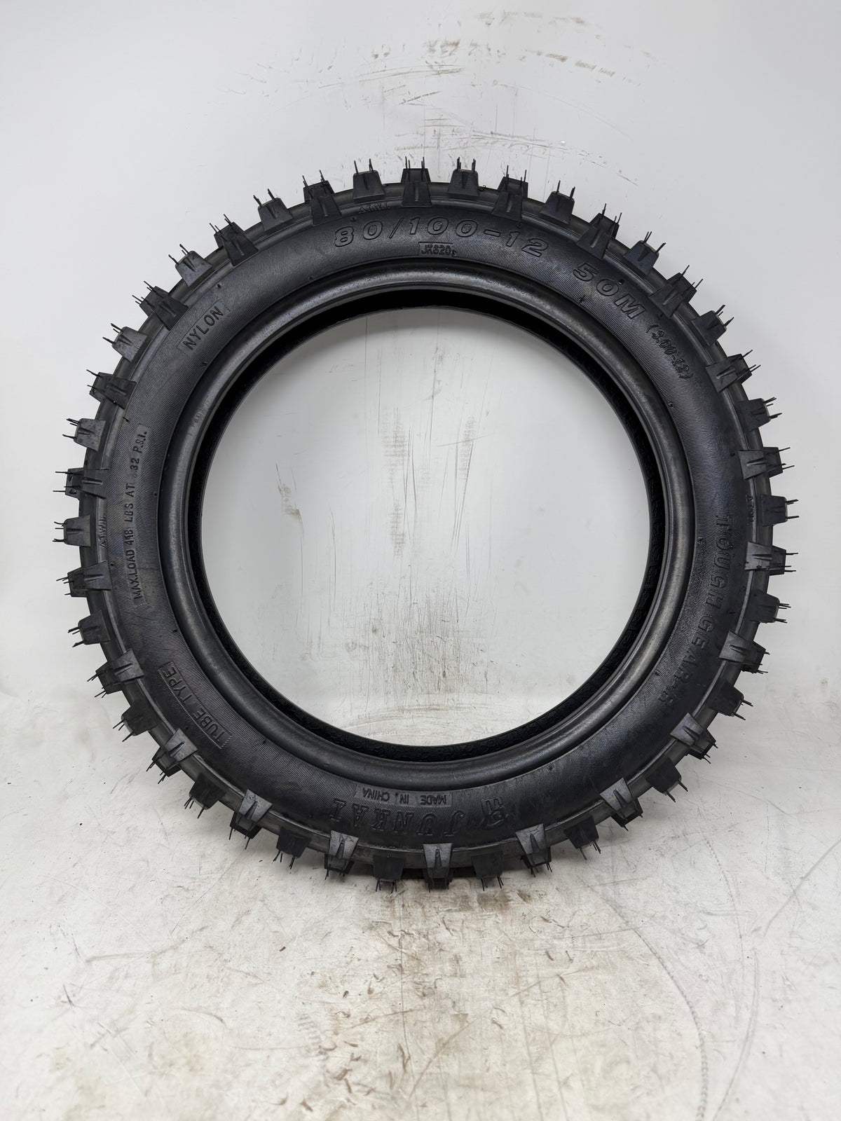 80/100-12 motorcycle tire, full sidewall view