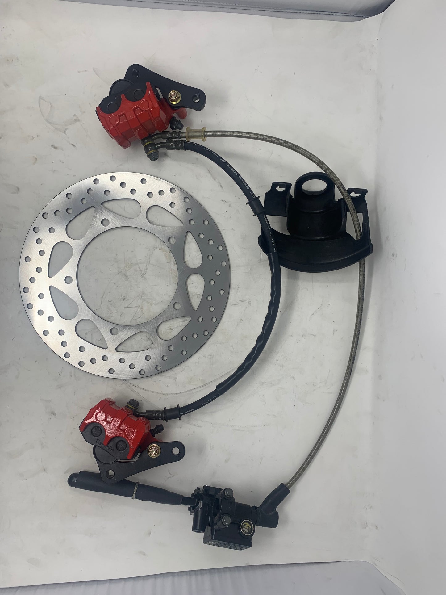 BD125-11 Venom X22 125cc front brake caliper and hose