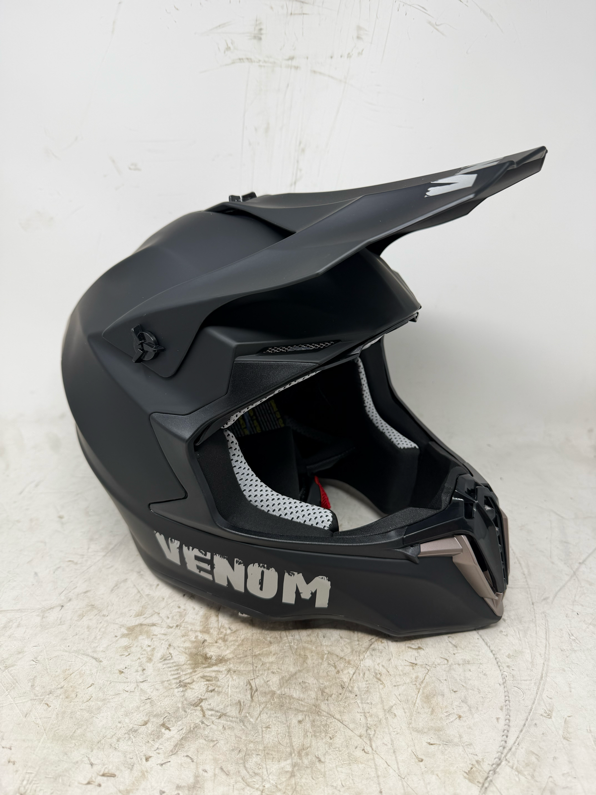 Matte black DOT certified dirt bike and ATV helmet with motocross peak visor