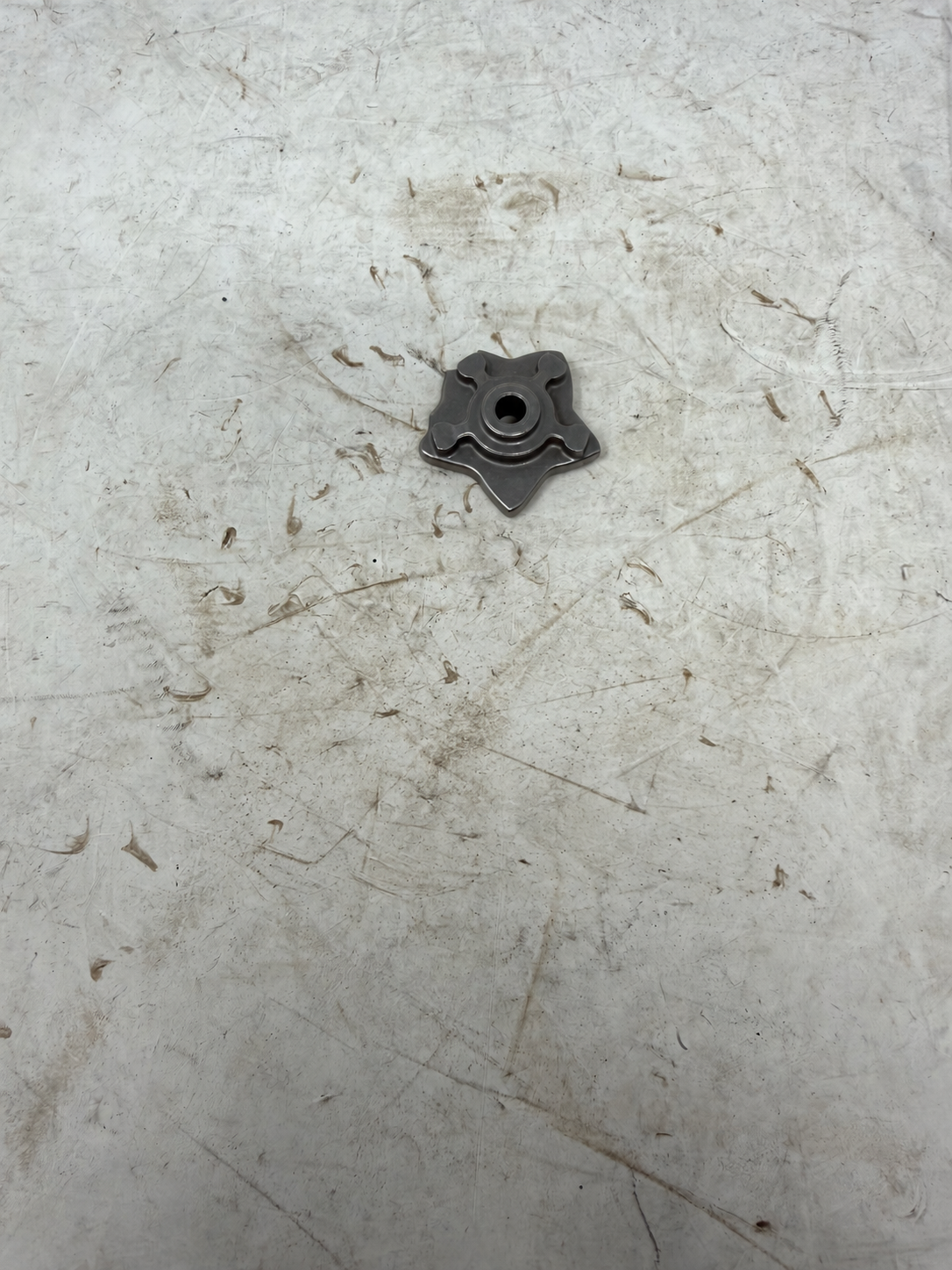 Gear selector stopping plate for DF250RTG Sportster 250cc motorcycle, front view of five-lobed metal plate
