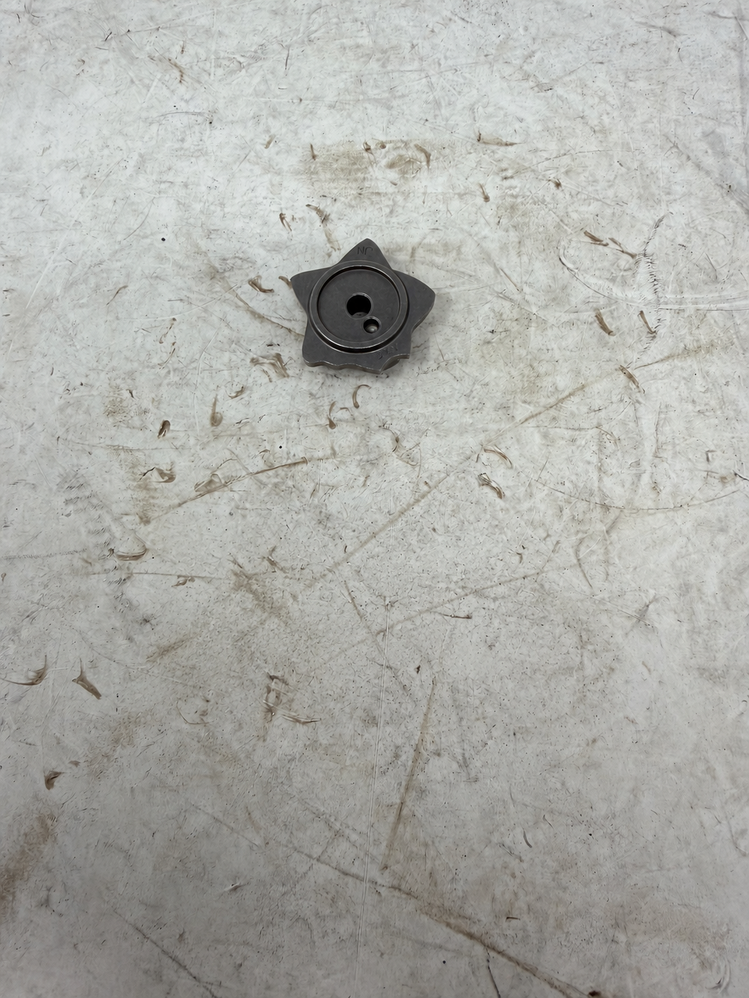 Gear selector stopping plate for DF250RTG Sportster 250cc motorcycle, reverse view showing mounting holes