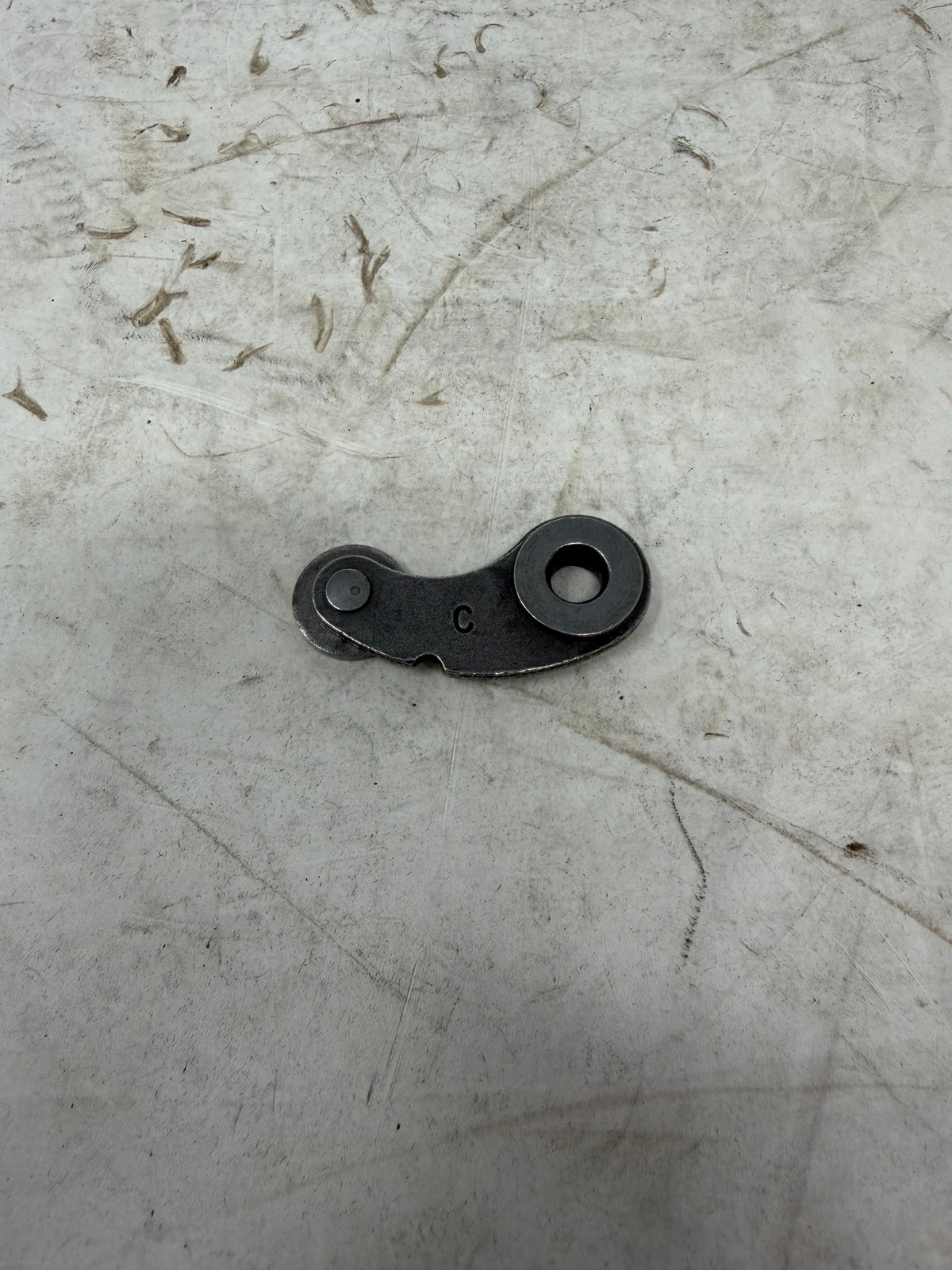 DF250RTG Sportster 250cc gearshift locating plate assembly with roller and pivot opening, kit component detail