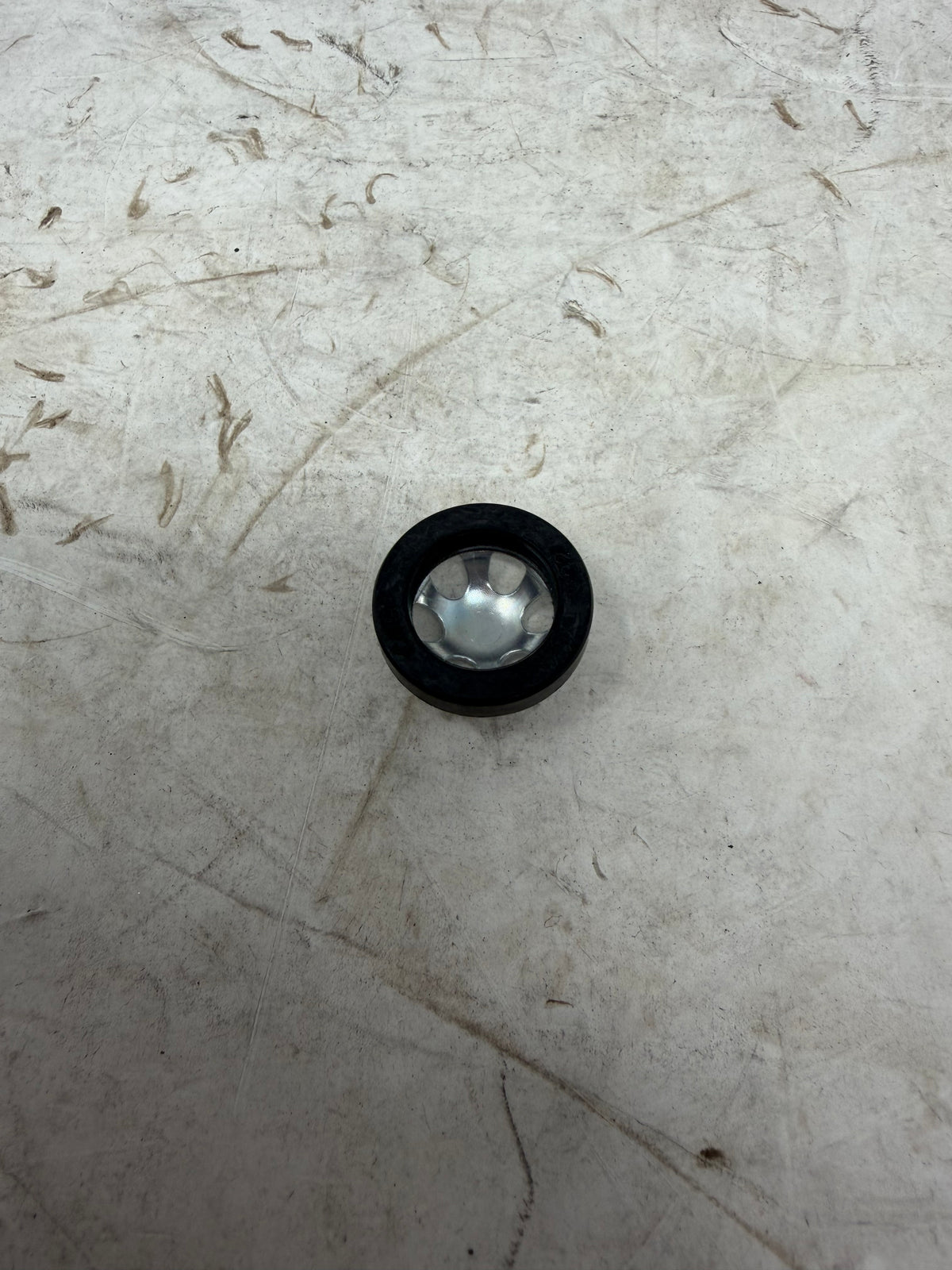 DF250RTG Venom Sportster 250cc engine oil level sight window showing the glass face, part 12426-I008-0000