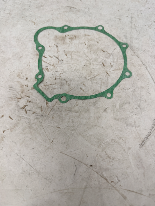 Green right crankcase cover gasket for DF250RTG Sportster 250cc motorcycle, showing sealing outline and bolt holes