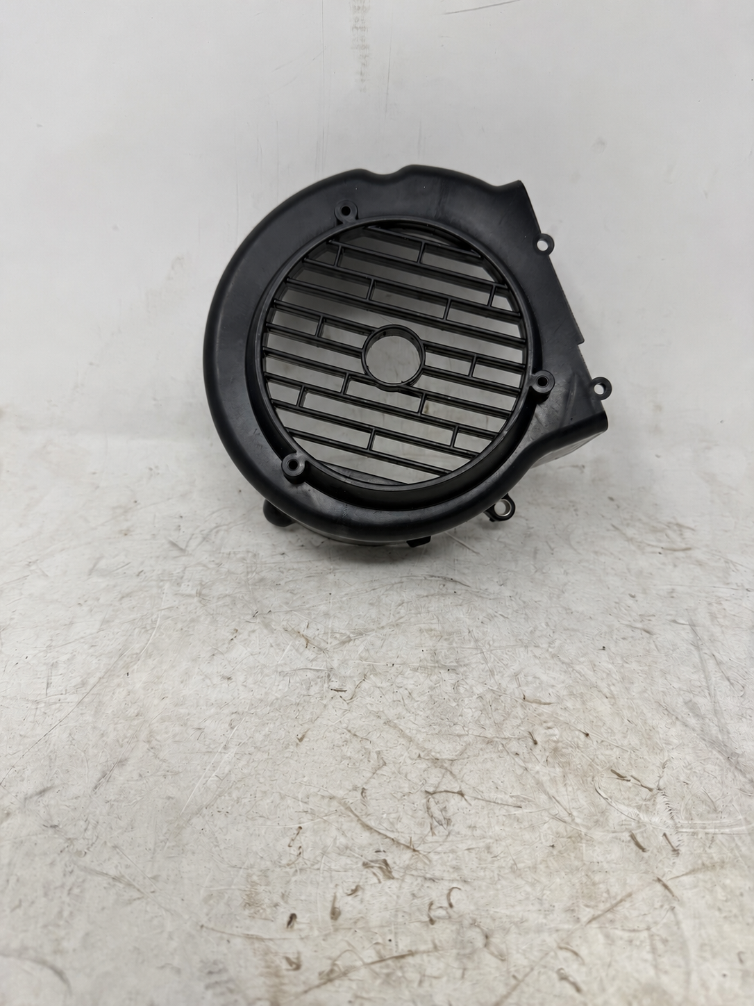 Black engine cooling fan cover with side inspection plug for Venom X19 200cc DF200SST-23, outside grille view