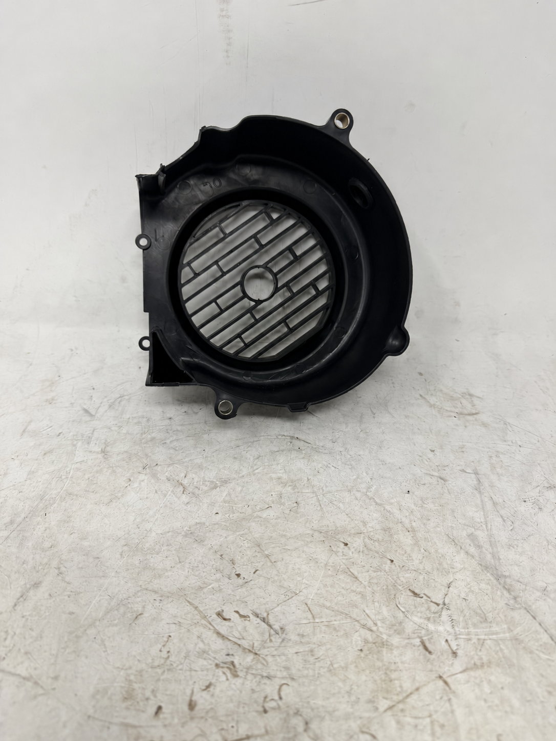 Inside view of cooling fan shroud and installed side inspection plug for Venom X19 200cc DF200SST-23
