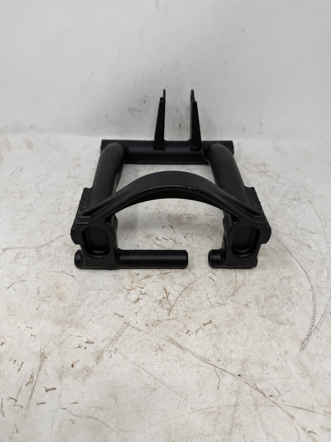 Black tubular engine hanger mount for Venom X19 200cc DF200SST-23, showing pivot housings and mounting tabs