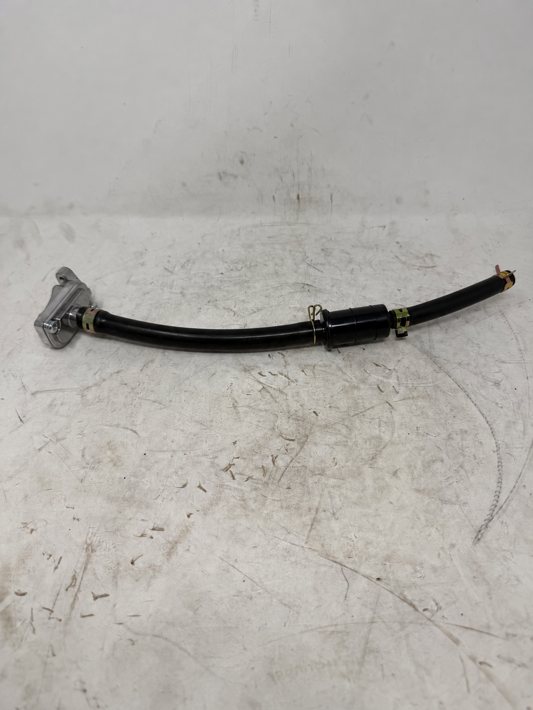 Reverse view of Venom X19 200cc DF200SST-23 secondary air injection hose assembly with inline valve