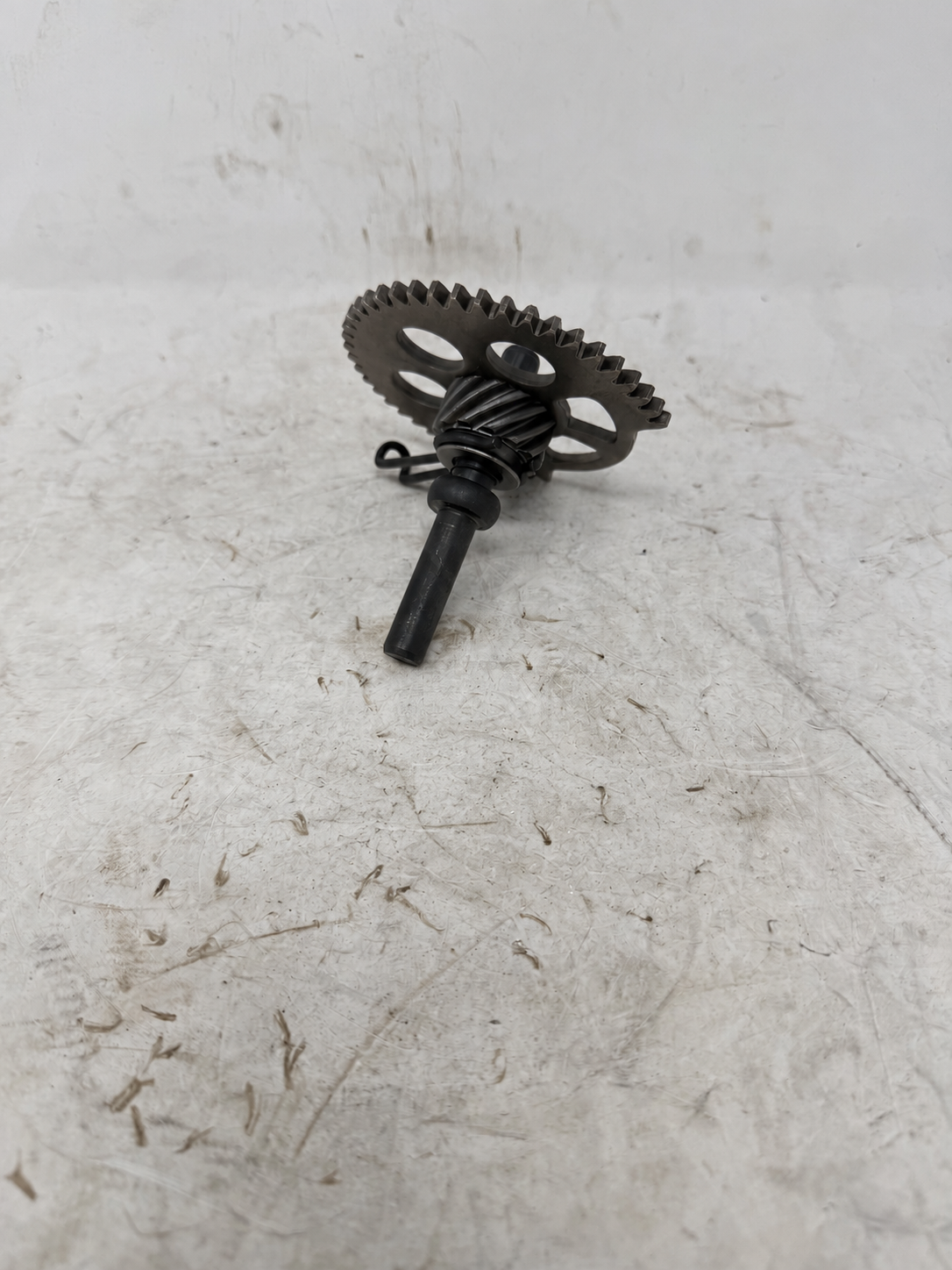 Reverse view of Venom X19 200cc DF200SST-23 kick starter idler gear assembly with spring and sliding shaft