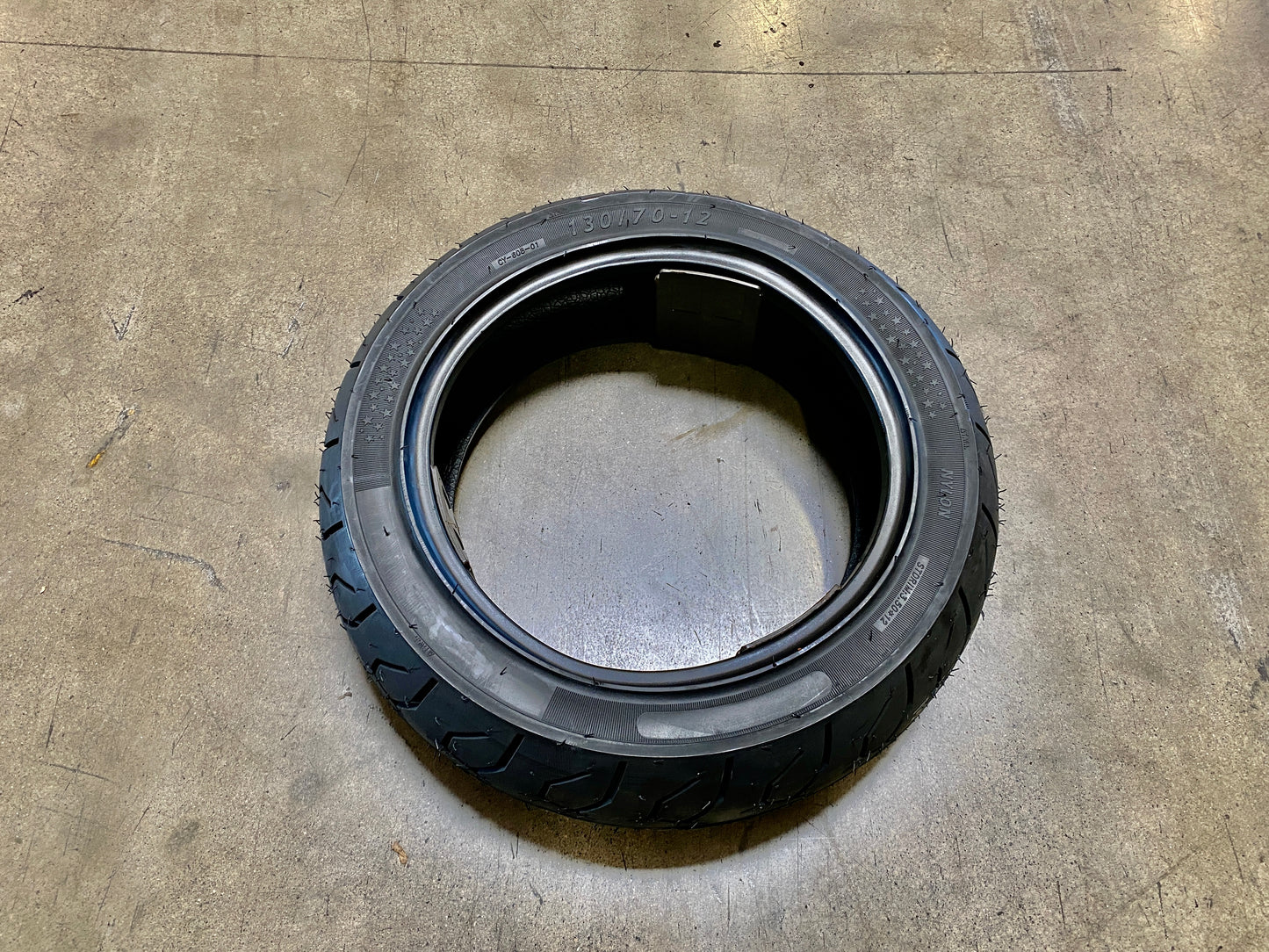 130/70-12 rear tire for sale online. Tire size 130/70-12